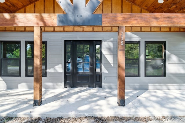 doorway to property featuring french doors