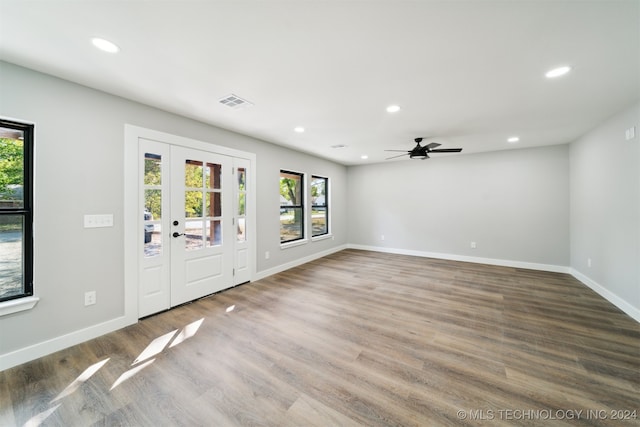 entryway with ceiling fan and hardwood / wood-style floors