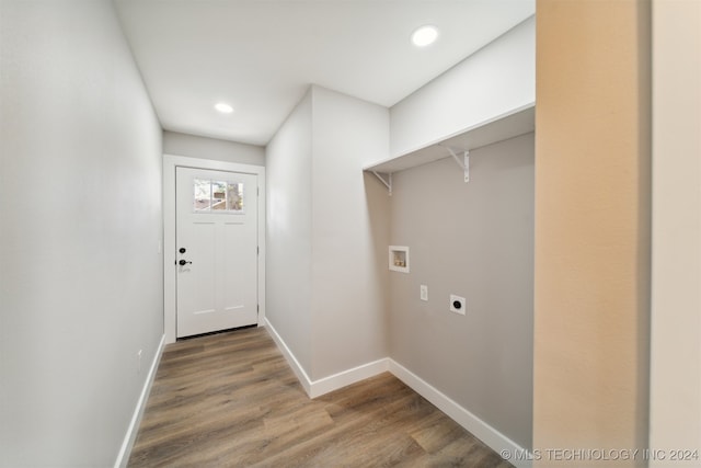 laundry area with hardwood / wood-style flooring, electric dryer hookup, and hookup for a washing machine