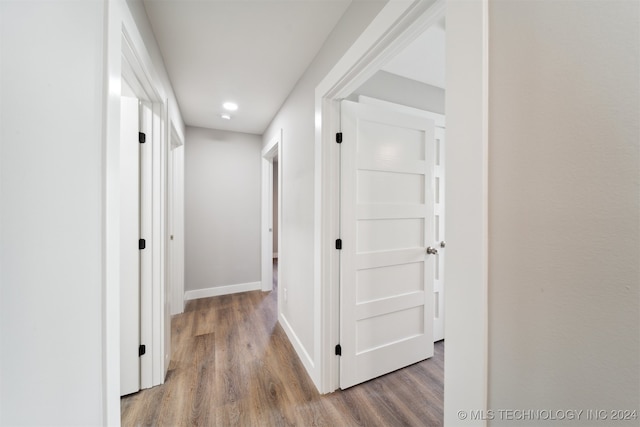 hall featuring hardwood / wood-style flooring