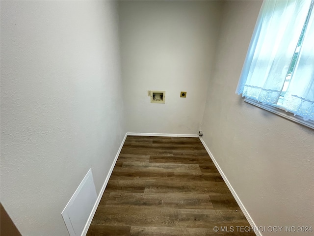 laundry room featuring washer hookup, electric dryer hookup, and dark hardwood / wood-style flooring