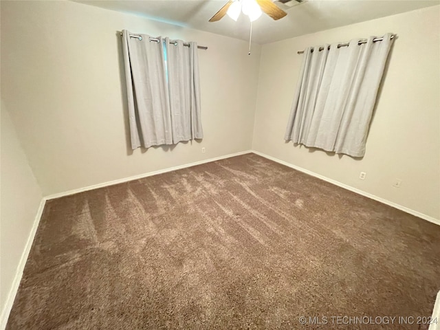 carpeted empty room with ceiling fan