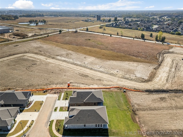 birds eye view of property featuring a rural view