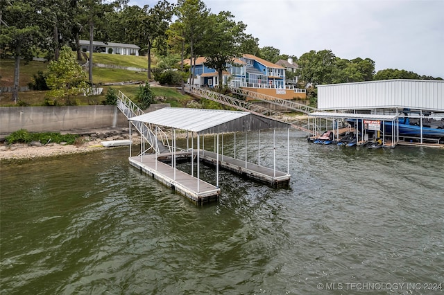 dock area with a water view