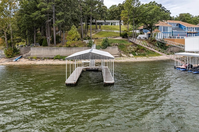 dock area with a water view