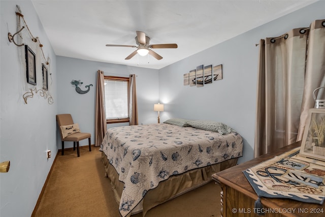 bedroom featuring light carpet and ceiling fan