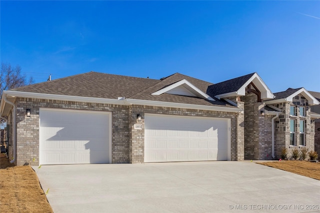 ranch-style home featuring a garage