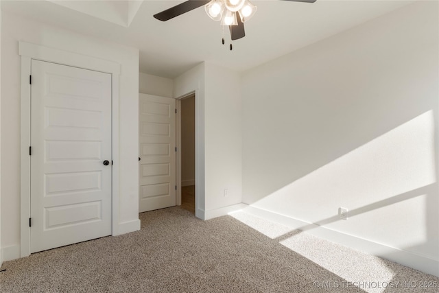 interior space featuring ceiling fan