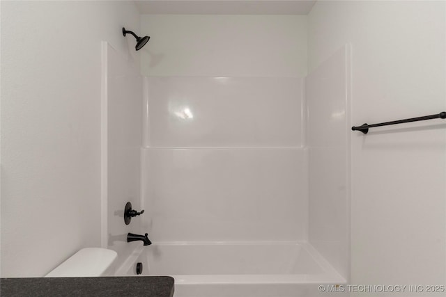 bathroom with shower / tub combination