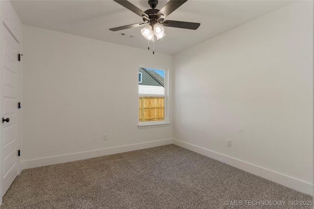 empty room featuring ceiling fan and carpet flooring