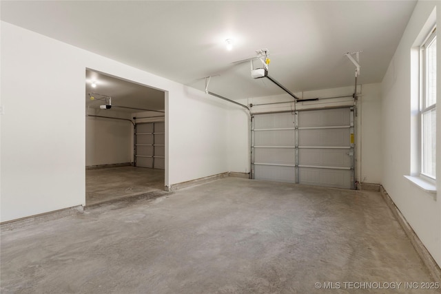 garage featuring a garage door opener