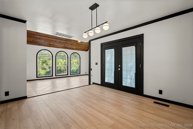 interior space featuring light hardwood / wood-style floors and french doors