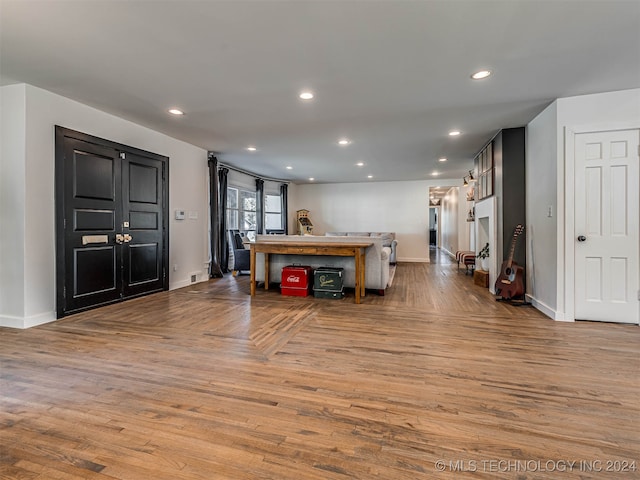 living room with light hardwood / wood-style flooring