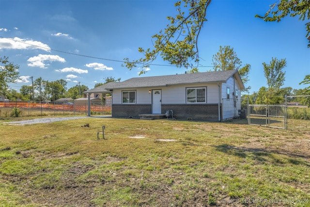 single story home featuring a front yard