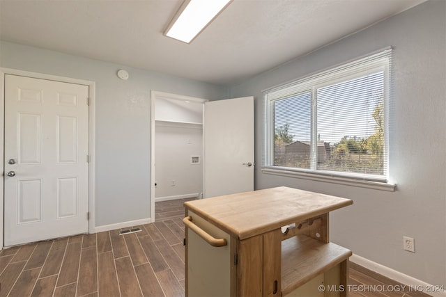 kitchen featuring dark wood-type flooring