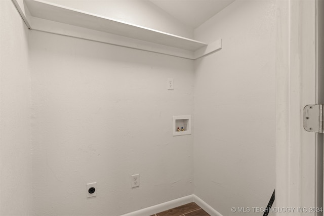 laundry area with washer hookup and hardwood / wood-style flooring