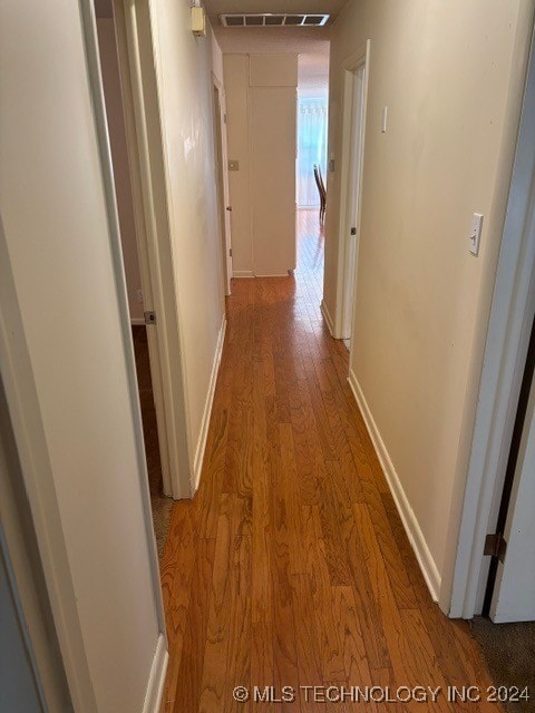 hallway featuring light hardwood / wood-style floors