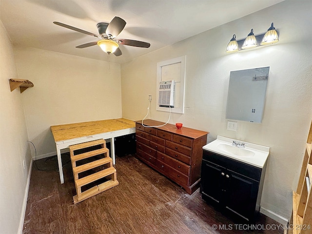 bathroom with wood-type flooring, vanity, a wall mounted air conditioner, and ceiling fan