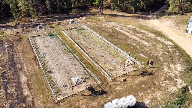 birds eye view of property featuring a rural view