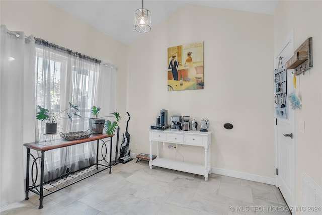 entryway with vaulted ceiling