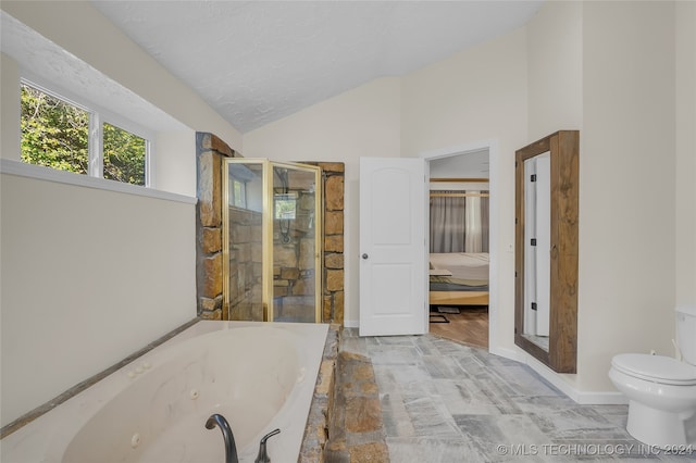 bathroom with plus walk in shower, lofted ceiling, hardwood / wood-style floors, and toilet