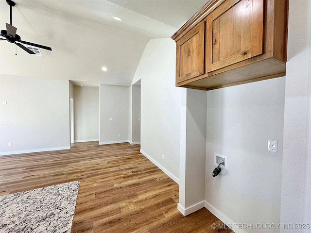 washroom featuring washer hookup, recessed lighting, a ceiling fan, light wood-type flooring, and baseboards