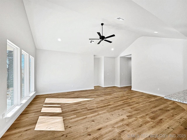 856 E Harlan Dr, Tahlequah, OK 74464 - unfurnished living room with vaulted ceiling, ceiling fan, wood finished floors, baseboards, and recessed lighting