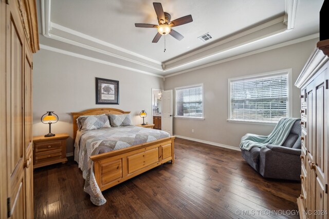 3691 E 390th Rd, Oologah, OK 74053 - bedroom with a tray ceiling, dark wood-style floors, baseboards, ornamental molding, and a ceiling fan