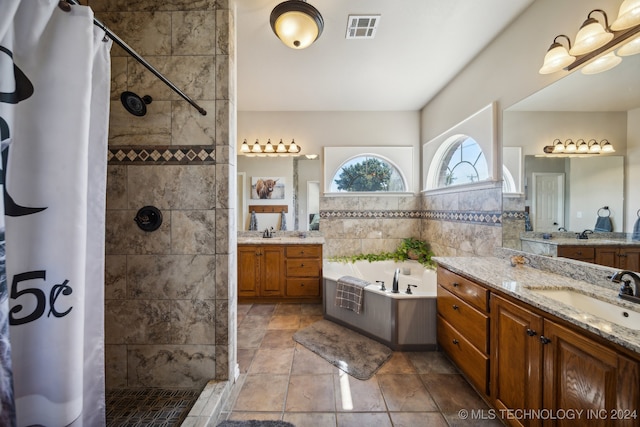 bathroom featuring vanity, plus walk in shower, and tile walls