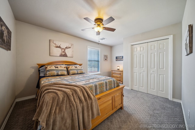 bedroom with ceiling fan, a closet, and dark colored carpet