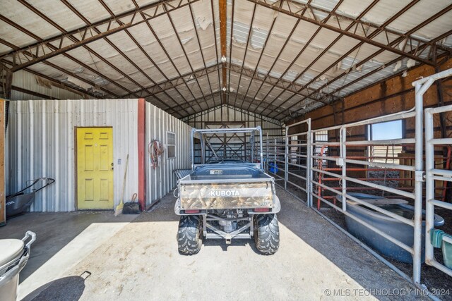 3691 E 390th Rd, Oologah, OK 74053 - garage featuring metal wall