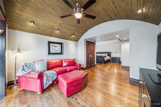 living room featuring ceiling fan, light wood-type flooring, vaulted ceiling, and wooden ceiling