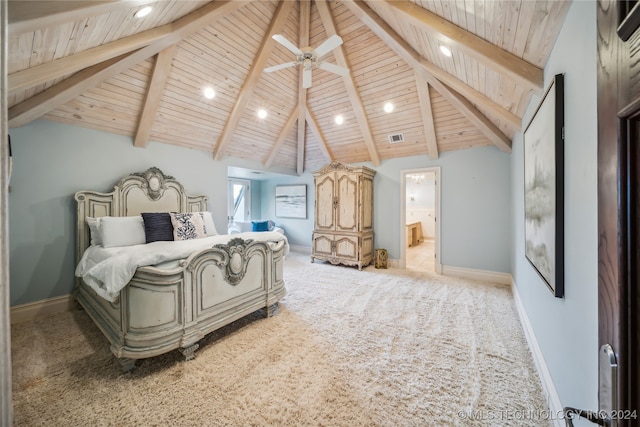 carpeted bedroom with wood ceiling, beam ceiling, and ensuite bath