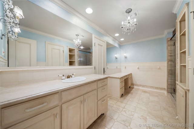 bathroom with vanity, a shower with shower door, a notable chandelier, and crown molding