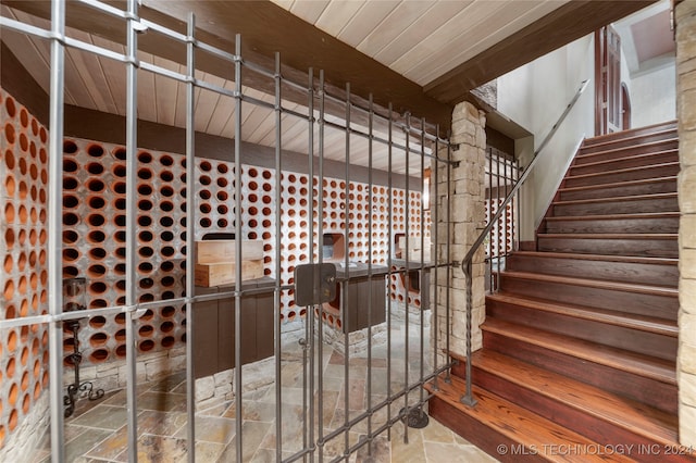 wine area with wood ceiling