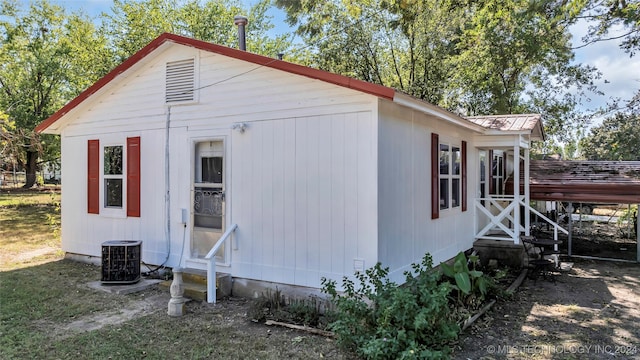 view of property exterior with central AC unit