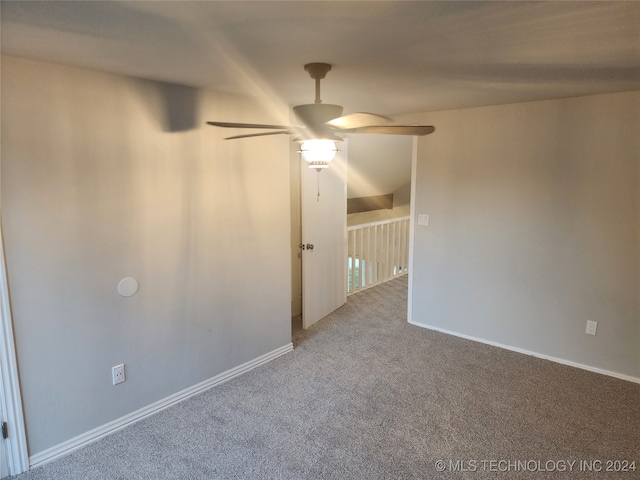 carpeted empty room with ceiling fan