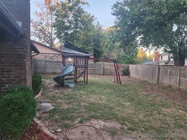 view of yard with a playground