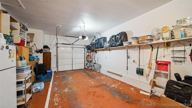 garage featuring white refrigerator