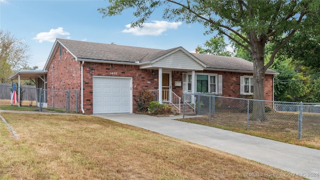 single story home with a garage and a front lawn