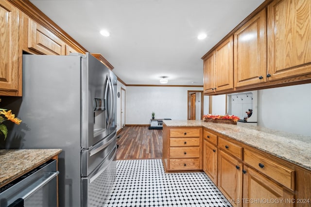 kitchen featuring light stone counters, kitchen peninsula, stainless steel appliances, hardwood / wood-style floors, and crown molding