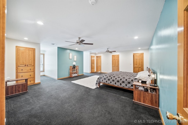 carpeted bedroom with ceiling fan