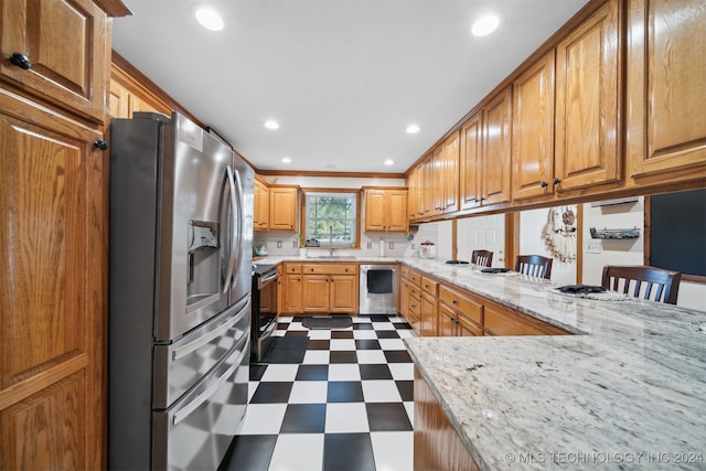 kitchen with light stone counters, kitchen peninsula, a kitchen bar, stainless steel appliances, and ornamental molding