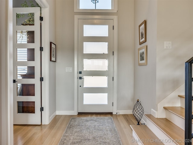 foyer entrance featuring light hardwood / wood-style flooring