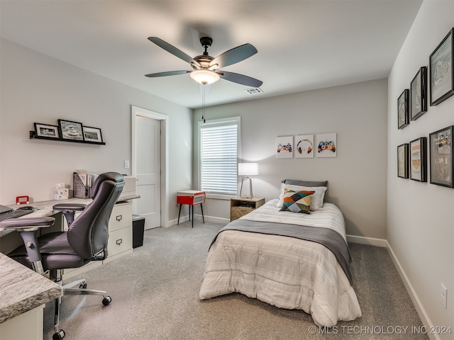 carpeted bedroom with ceiling fan