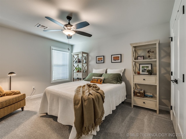 carpeted bedroom featuring ceiling fan