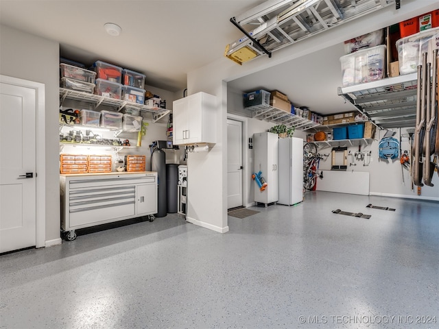 garage with white fridge