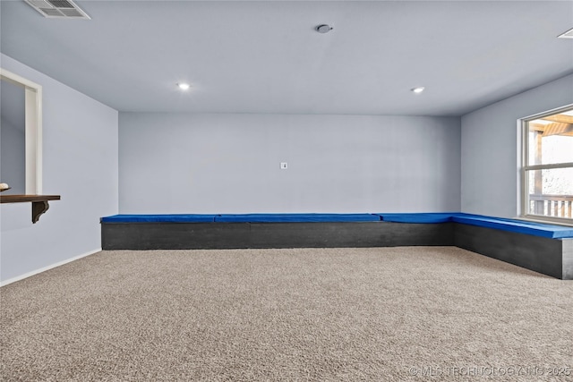 unfurnished room featuring recessed lighting, visible vents, and carpet floors