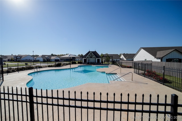 view of pool with a patio area