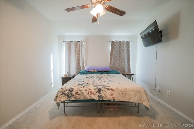 bedroom with ceiling fan and carpet flooring